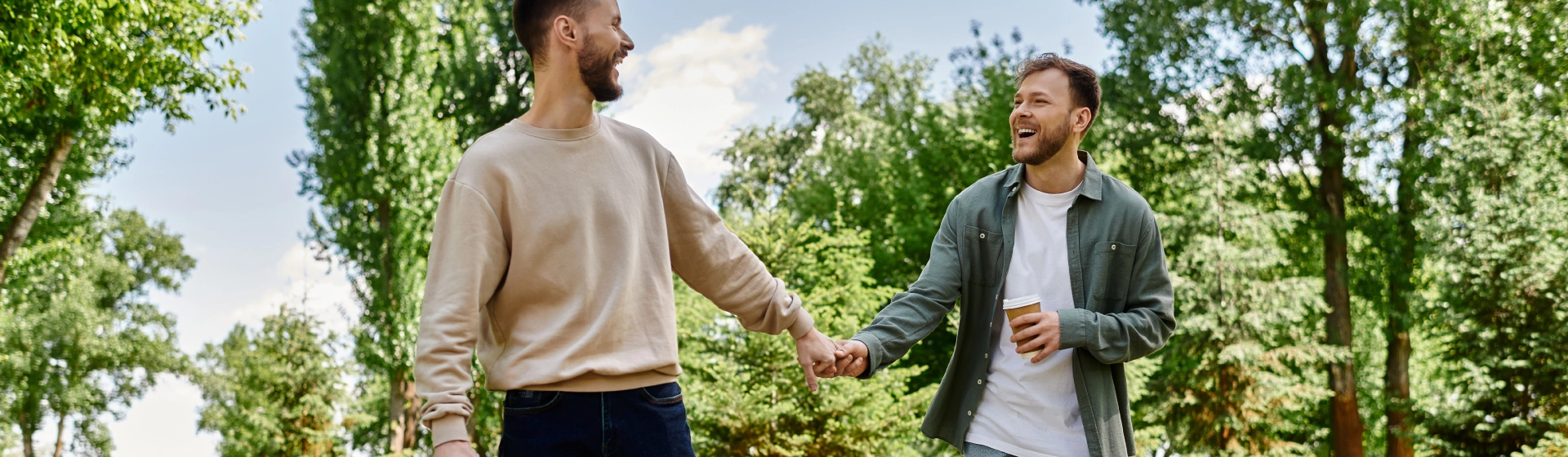two guys holding hands